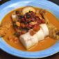 Semangkuk bubur pedas khas Singkawang yang kaya rempah dan sayuran segar, siap memanjakan lidah dengan cita rasa uniknya. Taburan teri dan kacang tanah renyah menambah tekstur yang menggugah selera.