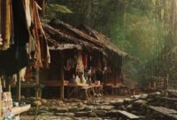 Petugas medis sedang berinteraksi dengan masyarakat di sebuah pusat kesehatan desa terpencil di Kalimantan Barat, menunjukkan dedikasi dalam memberikan layanan di tengah keterbatasan akses. Gambar ini merefleksikan upaya tanpa henti untuk memastikan setiap individu mendapatkan perhatian kesehatan yang layak.